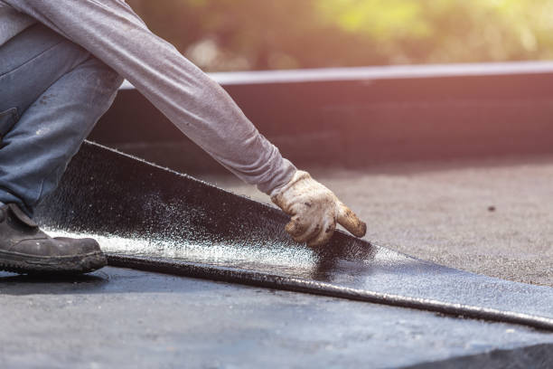Professional Exterior Waterproofing technician working in Glen Head, NY